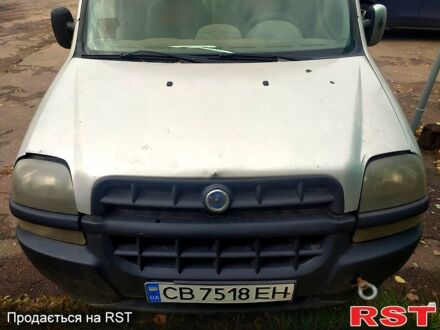 Серый Фиат Добло, объемом двигателя 1.9 л и пробегом 250 тыс. км за 1550 $, фото 1 на Automoto.ua