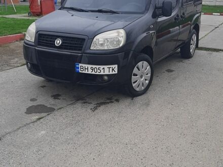 Серый Фиат Добло, объемом двигателя 1.4 л и пробегом 250 тыс. км за 3000 $, фото 1 на Automoto.ua