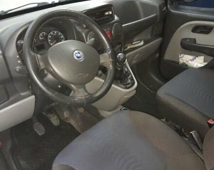 Синий Фиат Добло, объемом двигателя 1.4 л и пробегом 181 тыс. км за 3500 $, фото 9 на Automoto.ua