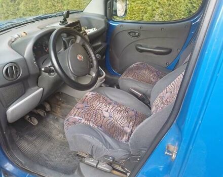 Синий Фиат Добло, объемом двигателя 1.25 л и пробегом 400 тыс. км за 4500 $, фото 2 на Automoto.ua