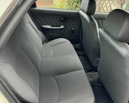 Белый Фиат Палио, объемом двигателя 1.2 л и пробегом 297 тыс. км за 1999 $, фото 4 на Automoto.ua