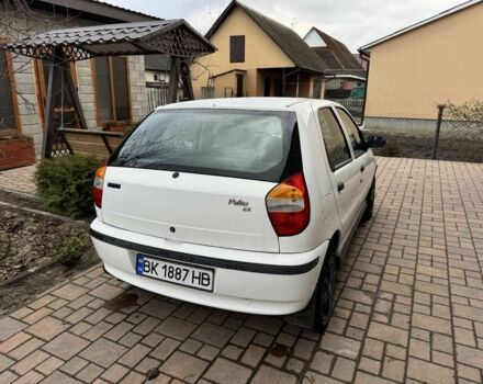 Белый Фиат Палио, объемом двигателя 1.2 л и пробегом 297 тыс. км за 1999 $, фото 2 на Automoto.ua