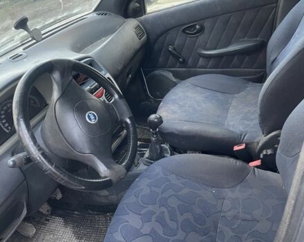 Білий Фіат Паліо, об'ємом двигуна 1.2 л та пробігом 100 тис. км за 700 $, фото 2 на Automoto.ua