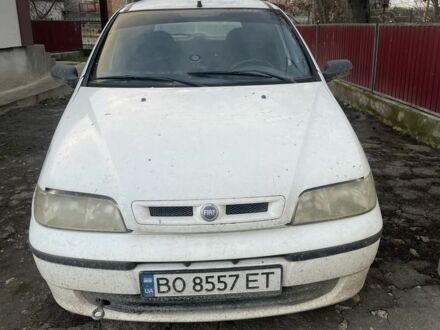 Білий Фіат Паліо, об'ємом двигуна 1.2 л та пробігом 100 тис. км за 700 $, фото 1 на Automoto.ua