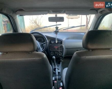 Сірий Фіат Паліо, об'ємом двигуна 1 л та пробігом 268 тис. км за 1850 $, фото 9 на Automoto.ua