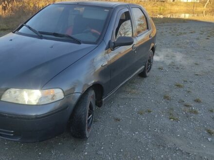 Серый Фиат Палио, объемом двигателя 1.2 л и пробегом 260 тыс. км за 1650 $, фото 1 на Automoto.ua