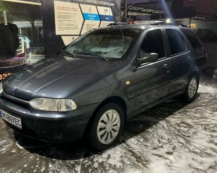 Синий Фиат Палио, объемом двигателя 1.24 л и пробегом 180 тыс. км за 2350 $, фото 1 на Automoto.ua