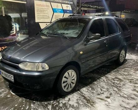 Синий Фиат Палио, объемом двигателя 1.24 л и пробегом 180 тыс. км за 2350 $, фото 1 на Automoto.ua