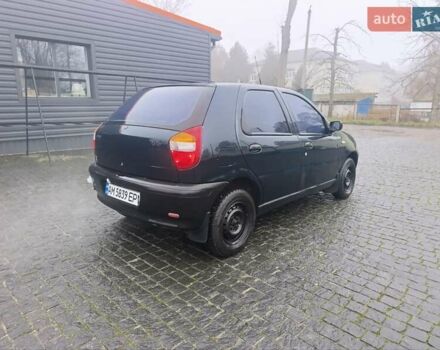 Зеленый Фиат Палио, объемом двигателя 1.3 л и пробегом 155 тыс. км за 1850 $, фото 3 на Automoto.ua