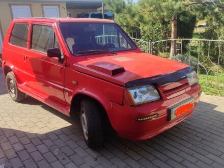 Червоний Фіат Панда, об'ємом двигуна 1 л та пробігом 1 тис. км за 388 $, фото 1 на Automoto.ua