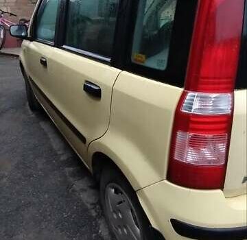 Желтый Фиат Панда, объемом двигателя 1.1 л и пробегом 160 тыс. км за 2400 $, фото 6 на Automoto.ua