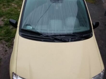 Желтый Фиат Панда, объемом двигателя 1.1 л и пробегом 160 тыс. км за 2400 $, фото 1 на Automoto.ua