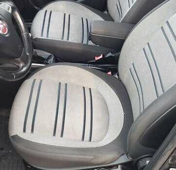 Чорний Фіат Пунто Ево, об'ємом двигуна 1.25 л та пробігом 271 тис. км за 4500 $, фото 10 на Automoto.ua