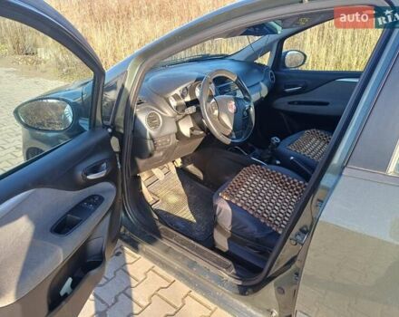 Зеленый Фиат Пунто Эво, объемом двигателя 1.37 л и пробегом 217 тыс. км за 5150 $, фото 7 на Automoto.ua