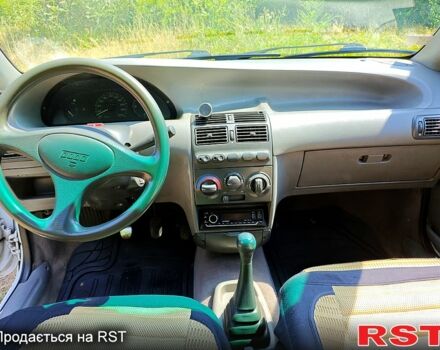 Белый Фиат Пунто, объемом двигателя 1.1 л и пробегом 411 тыс. км за 1800 $, фото 8 на Automoto.ua