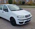 Белый Фиат Пунто, объемом двигателя 1.24 л и пробегом 159 тыс. км за 3650 $, фото 4 на Automoto.ua