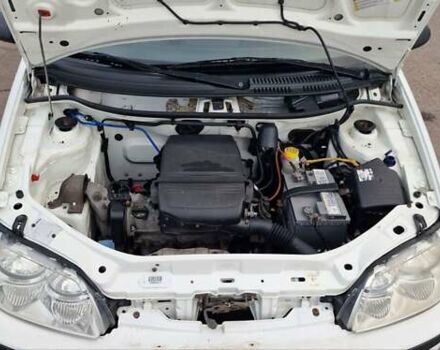 Белый Фиат Пунто, объемом двигателя 1.24 л и пробегом 159 тыс. км за 3650 $, фото 6 на Automoto.ua