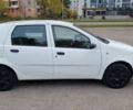 Белый Фиат Пунто, объемом двигателя 1.24 л и пробегом 159 тыс. км за 3400 $, фото 1 на Automoto.ua