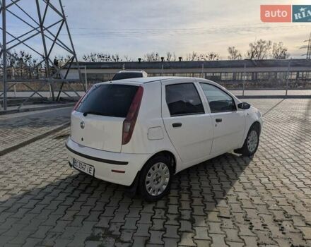 Белый Фиат Пунто, объемом двигателя 1.24 л и пробегом 199 тыс. км за 3500 $, фото 7 на Automoto.ua