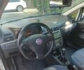 Білий Фіат Пунто, об'ємом двигуна 1.2 л та пробігом 250 тис. км за 5316 $, фото 10 на Automoto.ua