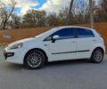 Белый Фиат Пунто, объемом двигателя 1.25 л и пробегом 245 тыс. км за 5500 $, фото 1 на Automoto.ua