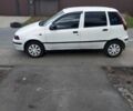 Белый Фиат Пунто, объемом двигателя 1.3 л и пробегом 285 тыс. км за 1451 $, фото 1 на Automoto.ua