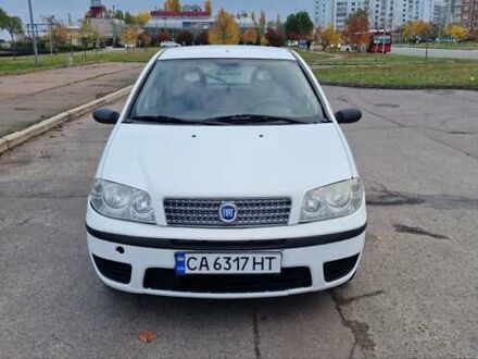 Белый Фиат Пунто, объемом двигателя 1.24 л и пробегом 159 тыс. км за 3650 $, фото 1 на Automoto.ua