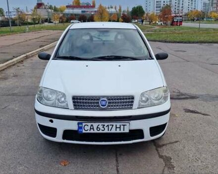 Белый Фиат Пунто, объемом двигателя 1.24 л и пробегом 159 тыс. км за 3650 $, фото 1 на Automoto.ua