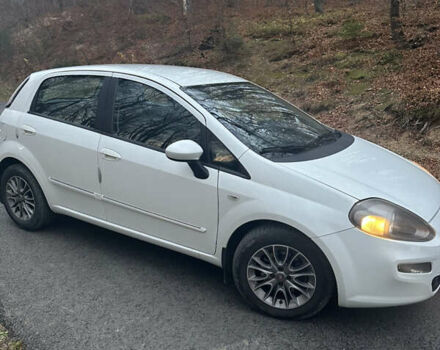 Белый Фиат Пунто, объемом двигателя 1.25 л и пробегом 258 тыс. км за 6300 $, фото 1 на Automoto.ua