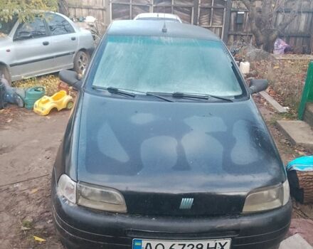Чорний Фіат Пунто, об'ємом двигуна 1.1 л та пробігом 200 тис. км за 953 $, фото 1 на Automoto.ua