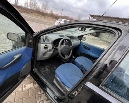 Чорний Фіат Пунто, об'ємом двигуна 1.4 л та пробігом 160 тис. км за 699 $, фото 5 на Automoto.ua