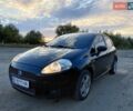 Черный Фиат Пунто, объемом двигателя 1.24 л и пробегом 234 тыс. км за 2999 $, фото 1 на Automoto.ua