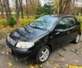 Черный Фиат Пунто, объемом двигателя 1.2 л и пробегом 150 тыс. км за 3990 $, фото 1 на Automoto.ua