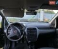 Черный Фиат Пунто, объемом двигателя 1.3 л и пробегом 281 тыс. км за 3500 $, фото 2 на Automoto.ua