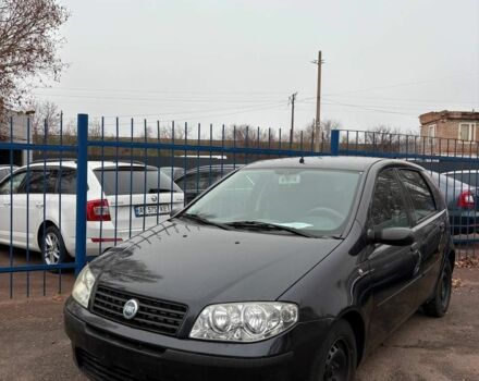 Черный Фиат Пунто, объемом двигателя 1.3 л и пробегом 196 тыс. км за 1750 $, фото 1 на Automoto.ua