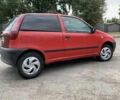 Красный Фиат Пунто, объемом двигателя 1.2 л и пробегом 290 тыс. км за 950 $, фото 2 на Automoto.ua