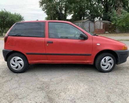 Красный Фиат Пунто, объемом двигателя 1.2 л и пробегом 290 тыс. км за 950 $, фото 3 на Automoto.ua