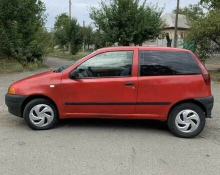 Красный Фиат Пунто, объемом двигателя 1.2 л и пробегом 290 тыс. км за 950 $, фото 5 на Automoto.ua