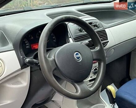 Красный Фиат Пунто, объемом двигателя 1.3 л и пробегом 234 тыс. км за 3990 $, фото 10 на Automoto.ua