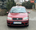 Красный Фиат Пунто, объемом двигателя 1.24 л и пробегом 234 тыс. км за 3890 $, фото 1 на Automoto.ua