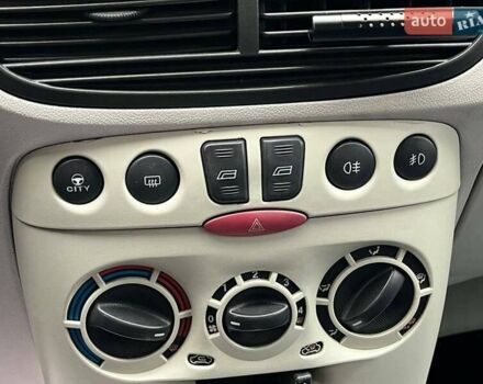 Красный Фиат Пунто, объемом двигателя 1.3 л и пробегом 234 тыс. км за 3990 $, фото 11 на Automoto.ua