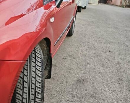 Красный Фиат Пунто, объемом двигателя 1.37 л и пробегом 110 тыс. км за 5300 $, фото 11 на Automoto.ua