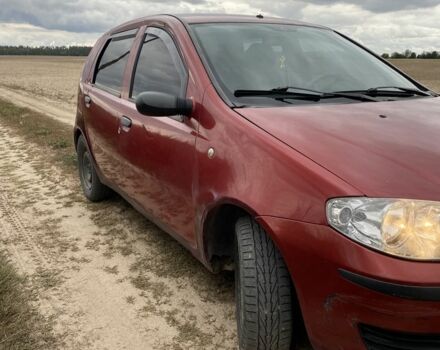 Красный Фиат Пунто, объемом двигателя 1.2 л и пробегом 490 тыс. км за 1800 $, фото 6 на Automoto.ua