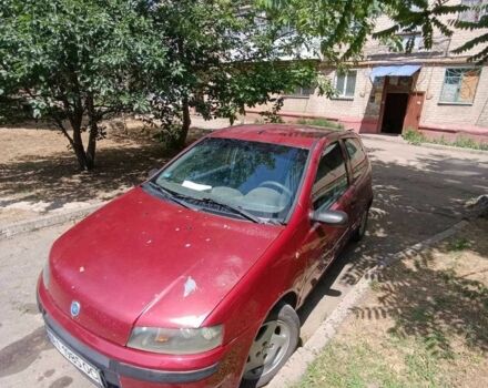 Красный Фиат Пунто, объемом двигателя 1.2 л и пробегом 298 тыс. км за 1299 $, фото 1 на Automoto.ua