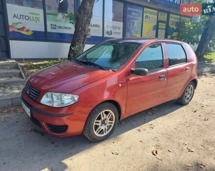Красный Фиат Пунто, объемом двигателя 1.24 л и пробегом 280 тыс. км за 2499 $, фото 1 на Automoto.ua