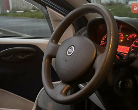 Синий Фиат Пунто, объемом двигателя 1.24 л и пробегом 168 тыс. км за 3500 $, фото 51 на Automoto.ua