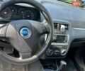 Синій Фіат Пунто, об'ємом двигуна 1.25 л та пробігом 240 тис. км за 2400 $, фото 5 на Automoto.ua