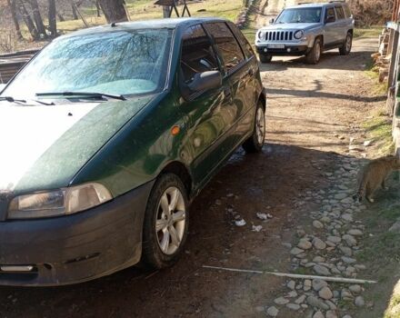 Зеленый Фиат Пунто, объемом двигателя 1.7 л и пробегом 319 тыс. км за 950 $, фото 2 на Automoto.ua