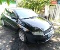 Черный Фиат Стило, объемом двигателя 1.6 л и пробегом 300 тыс. км за 2500 $, фото 1 на Automoto.ua
