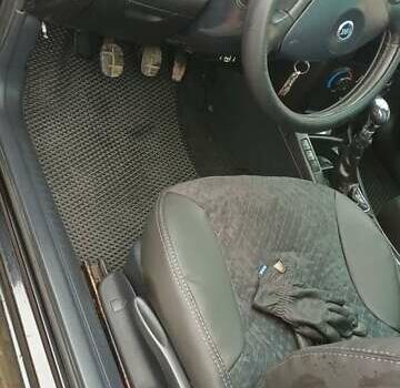 Черный Фиат Стило, объемом двигателя 1.9 л и пробегом 250 тыс. км за 3500 $, фото 5 на Automoto.ua